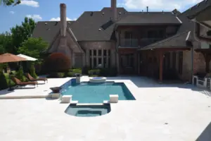 Ivory Travertine Remodeled Place Swimming Pool Project - Claffey Pools