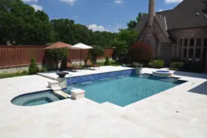 Ivory Travertine Remodeled Place Swimming Pool Project - Claffey Pools