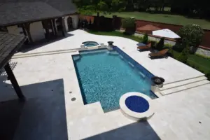 Ivory Travertine Remodeled Place Swimming Pool Project - Claffey Pools