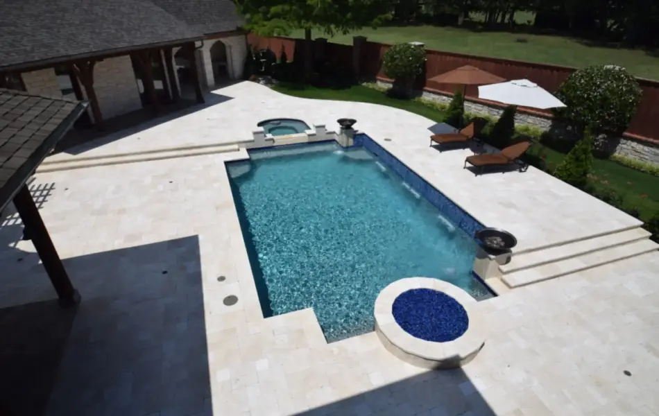 Ivory Travertine Remodeled Place Swimming Pool Project - Claffey Pools