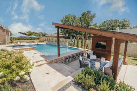 Unique Curved Wall With Step Down Outdoor Living Space