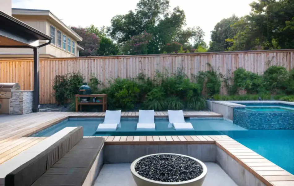 Pool side fire pit with seating area