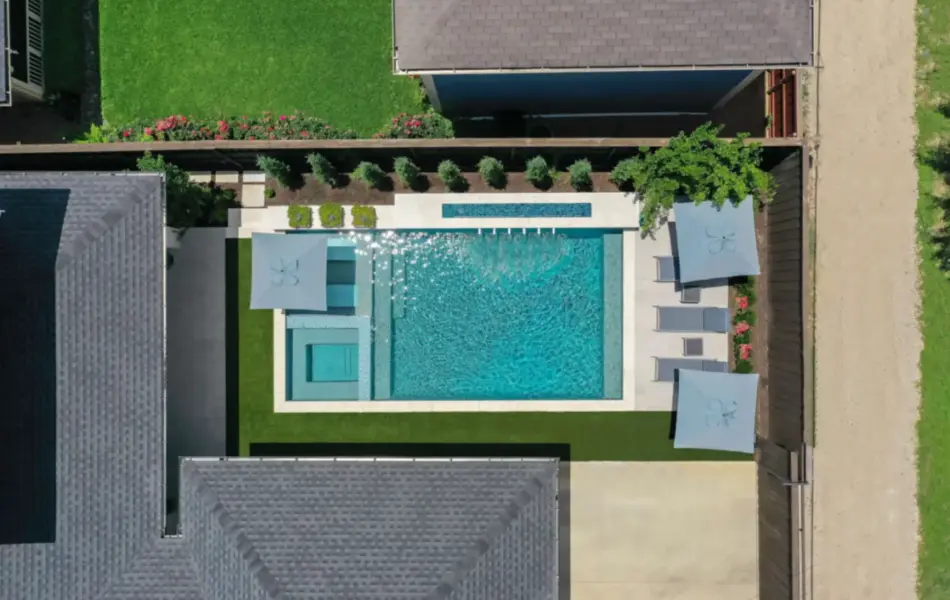 Bird's eye-view of geometric pool with integrated spa