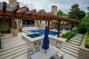 wooden arbor alongside geometric pool with integrated spa