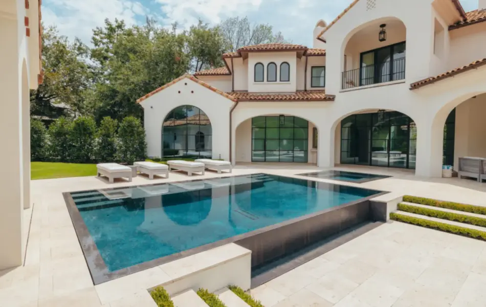 Award-winning luxury negative edge pool with integrated spa and outdoor cabana