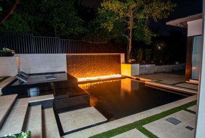 Small Modern Pool With Floating Fire & Water Wall