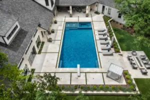 bird's eye-view of geometric pool with diving board