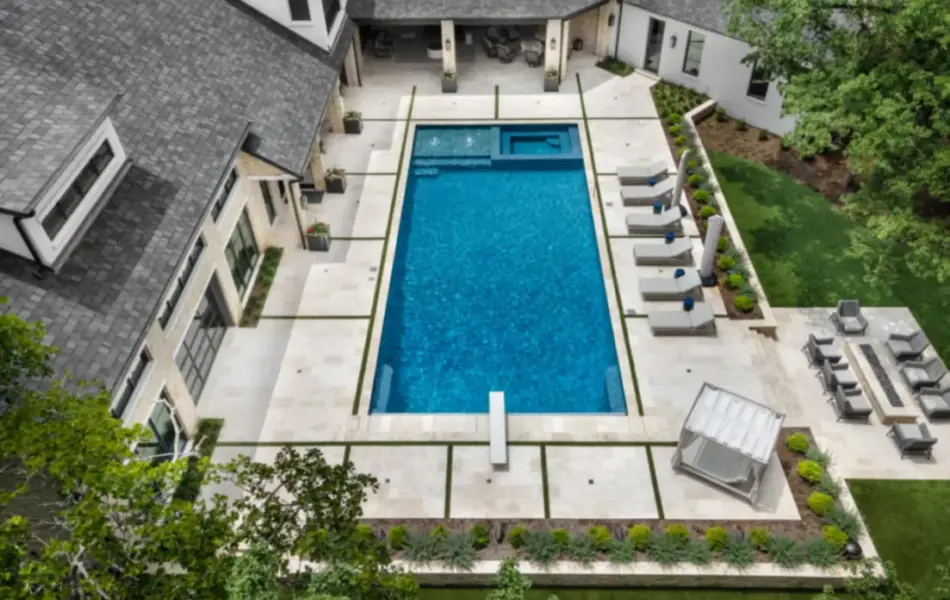 bird's eye-view of geometric pool with diving board