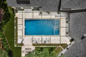bird's eye-view of geometric pool with diving board