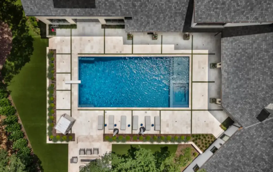 bird's eye-view of geometric pool with diving board